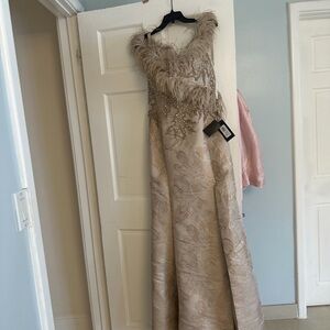 Terani Couture Champagne Feathered Gown
